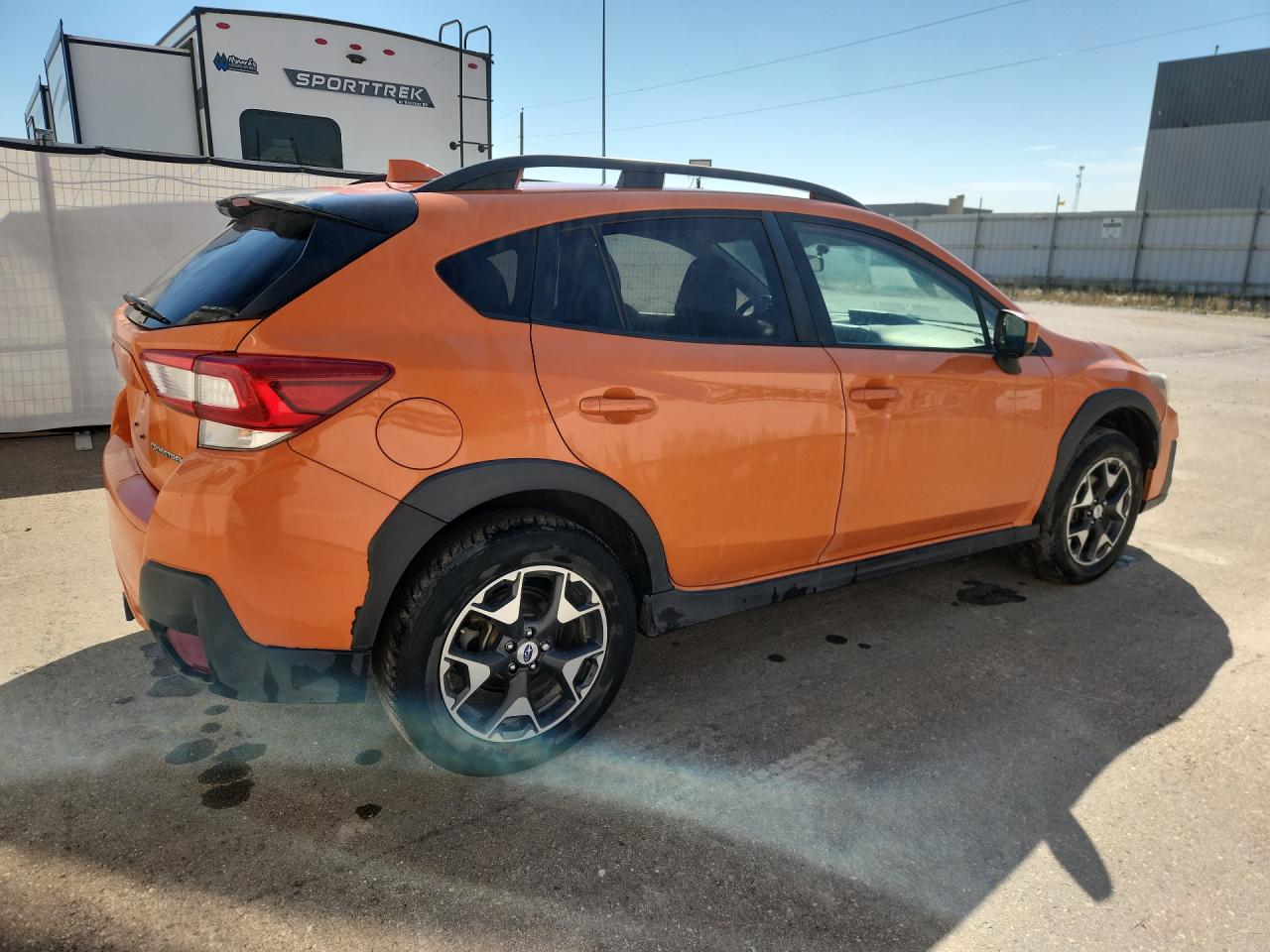 2018 Subaru Crosstrek Premium Orange vin: JF2GTABC3JH314815 Damage: Rear Bumper/Cover, Peeling, 3 To 4 Inches