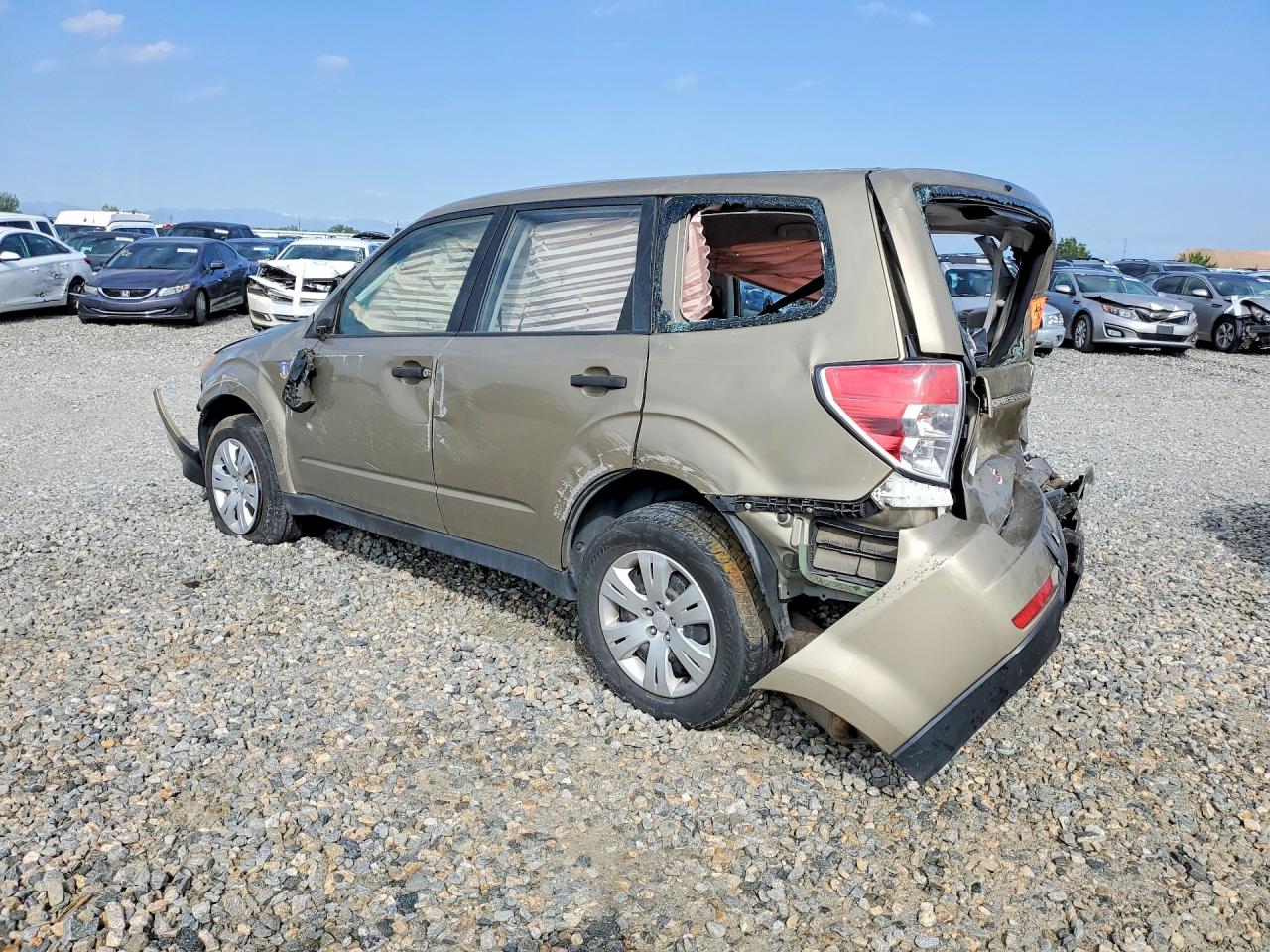 2009 Subaru Forester 2.5x Gold vin: JF2SH61629H748773