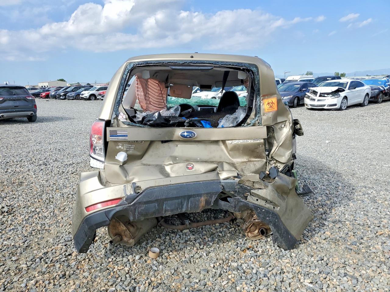 2009 Subaru Forester 2.5x Gold vin: JF2SH61629H748773