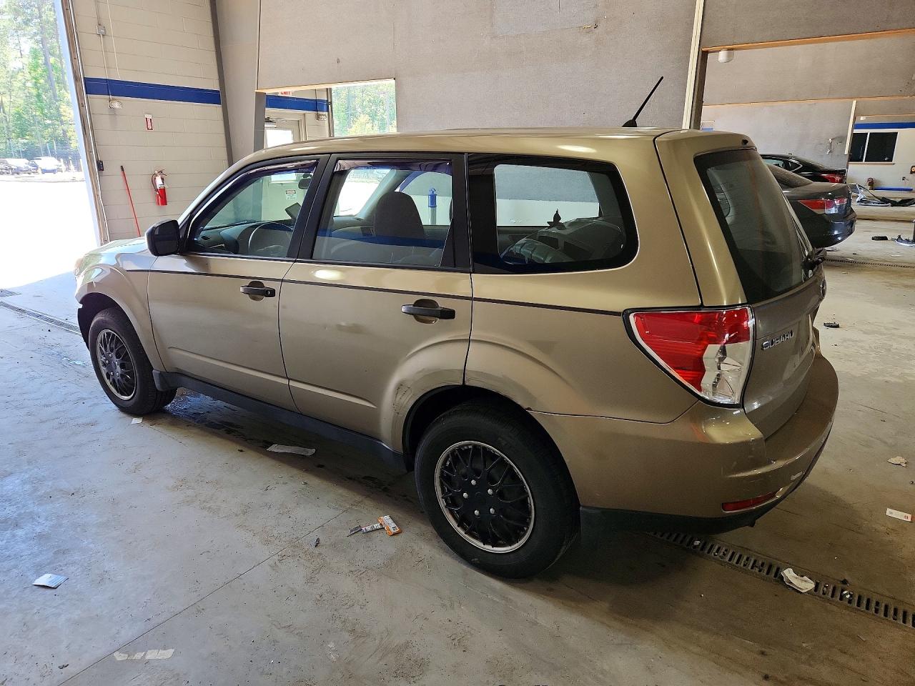 2009 Subaru Forester 2.5x Tan vin: JF2SH61699H765148