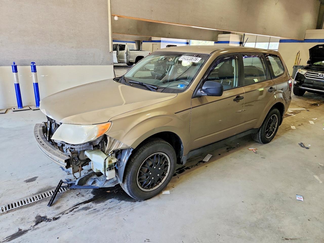 2009 Subaru Forester 2.5x Tan vin: JF2SH61699H765148