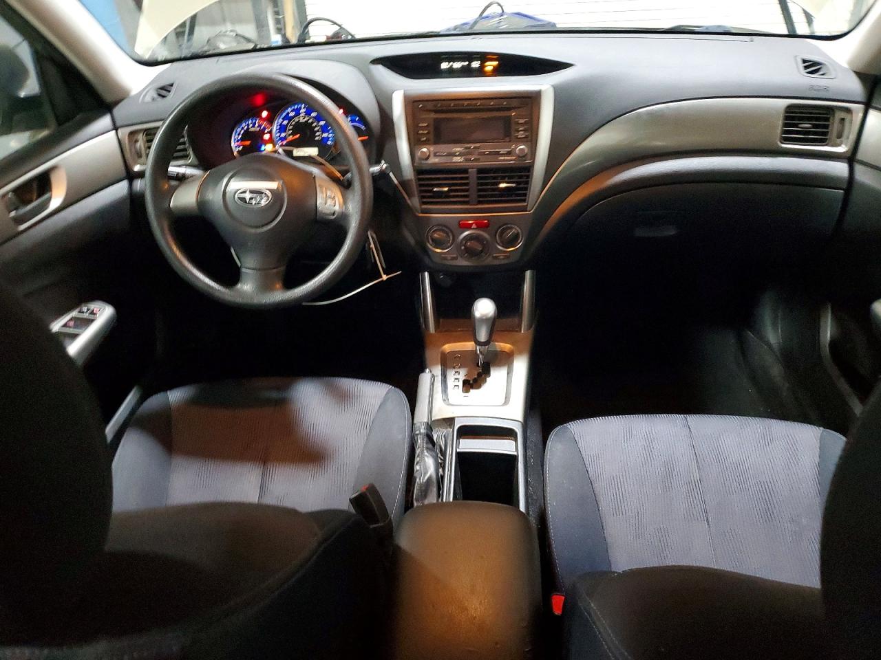 2009 Subaru Forester 2.5x Tan vin: JF2SH61699H791314