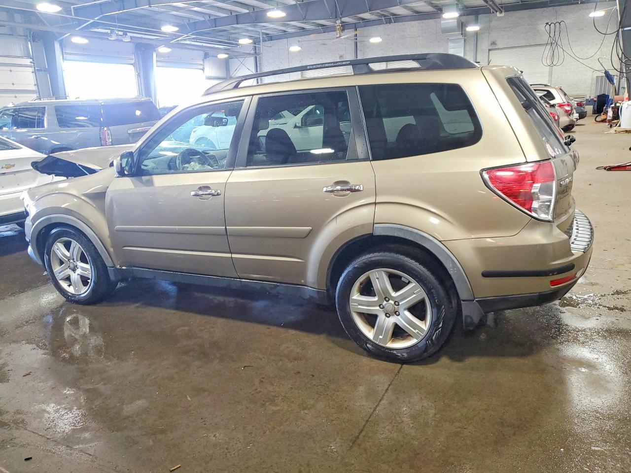 2009 Subaru Forester 2.5x Premium Tan vin: JF2SH63619H708519