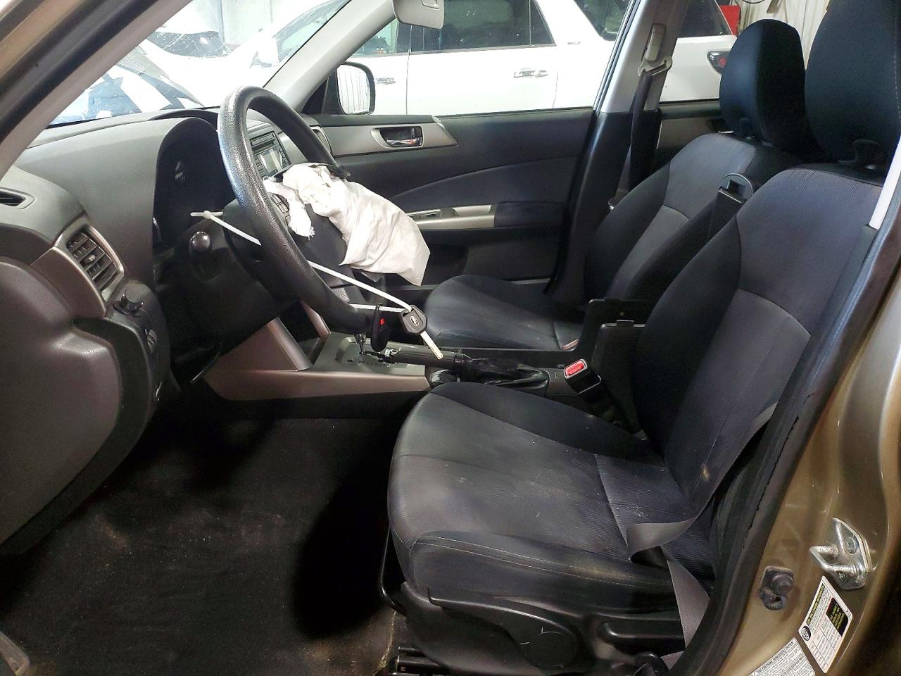 2009 Subaru Forester 2.5x Premium Tan vin: JF2SH63619H708519