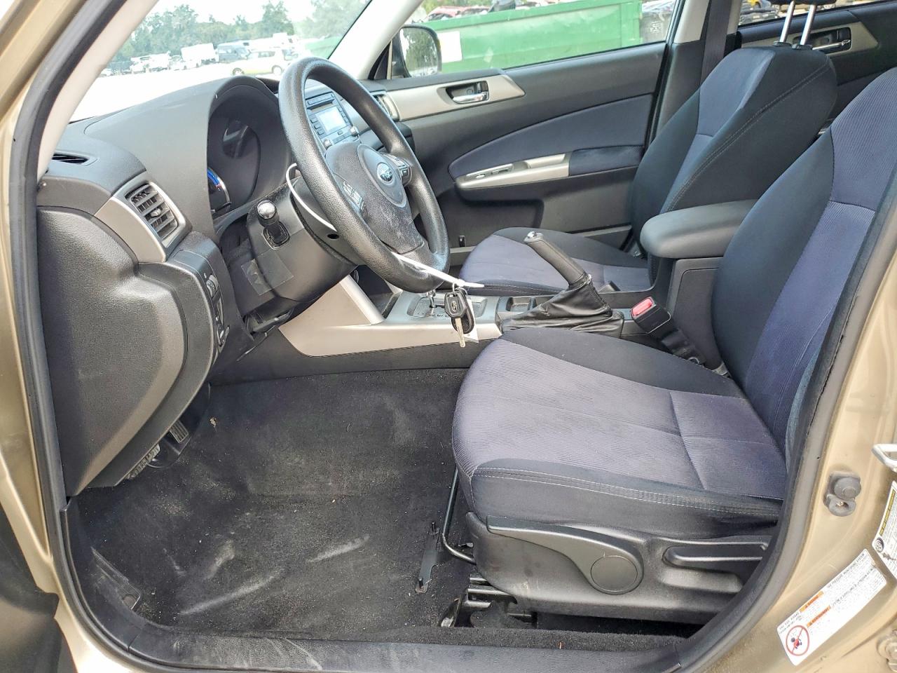 2009 Subaru Forester 2.5x Premium Tan vin: JF2SH63619H719987
