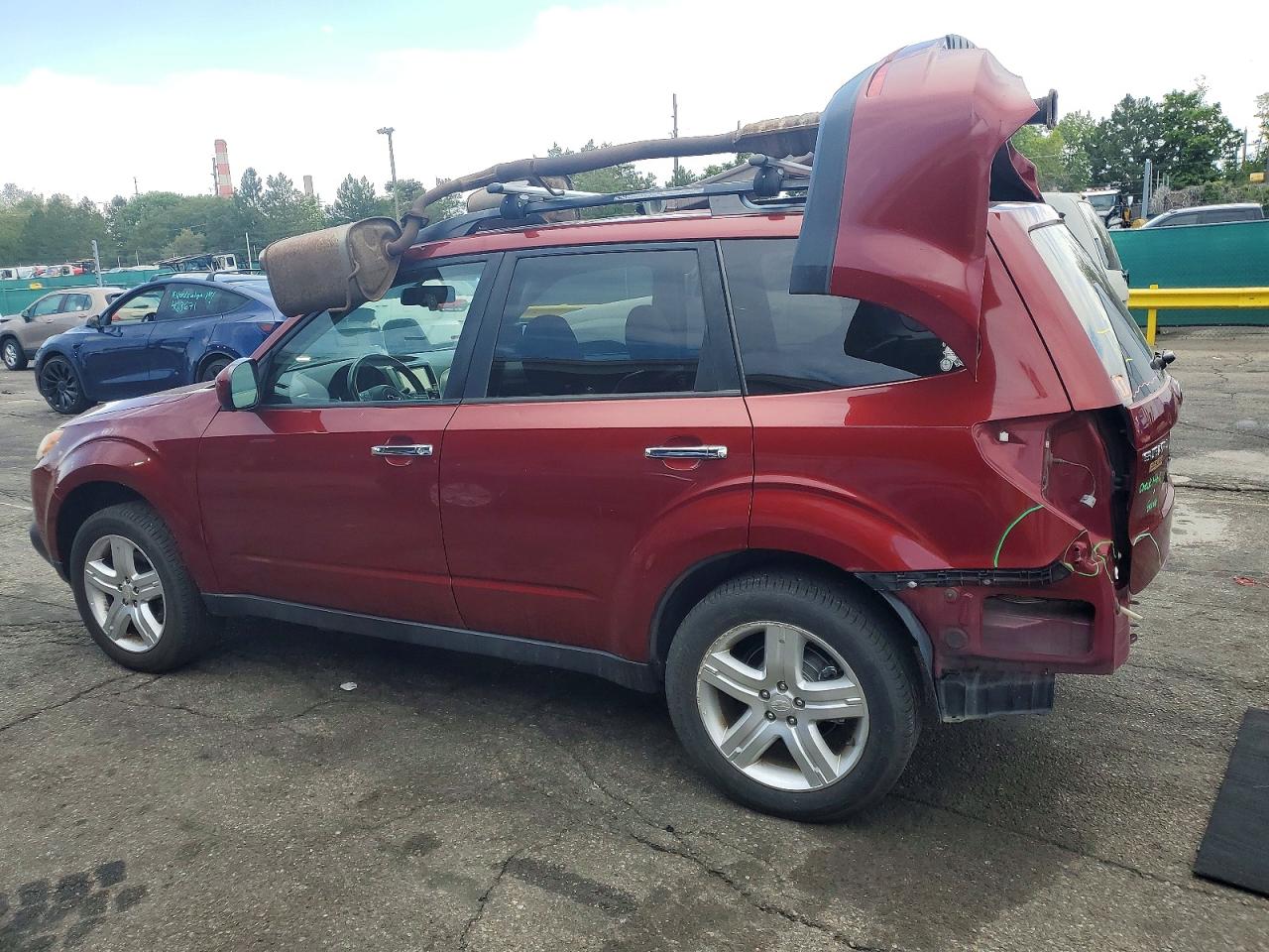 2009 Subaru Forester 2.5x Limited Burgundy vin: JF2SH64649H715303