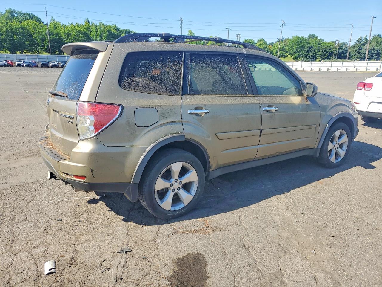 2009 Subaru Forester 2.5xt Tan vin: JF2SH65659H714126