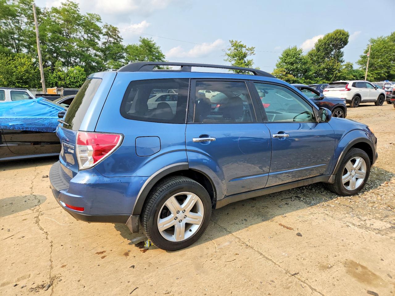 2010 Subaru Forester 2.5x Premium Blue vin: JF2SH6CC1AH785790