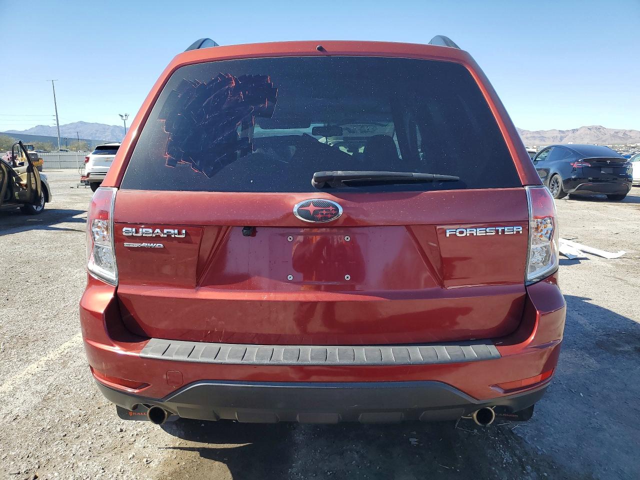 2010 Subaru Forester 2.5x Premium Burgundy vin: JF2SH6CC5AH761492