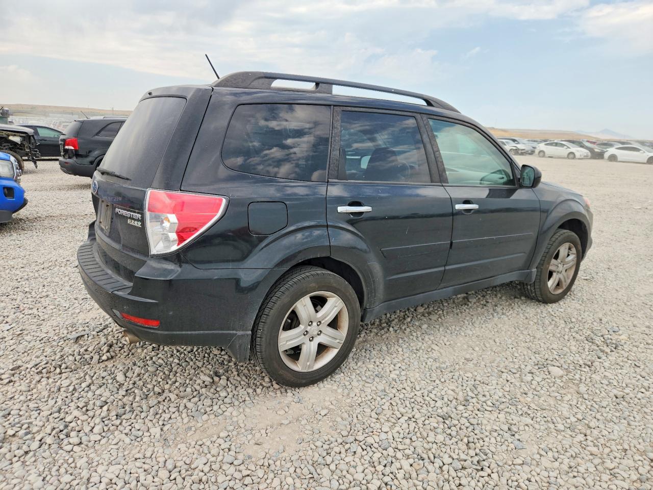 2010 Subaru Forester 2.5x Premium Black vin: JF2SH6CC6AH908323