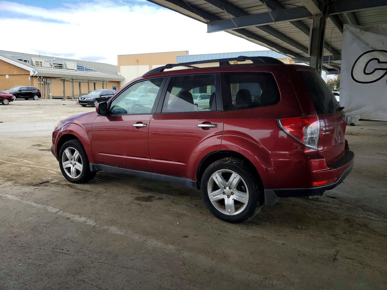 2010 Subaru Forester 2.5x Premium Burgundy vin: JF2SH6CC7AH786409