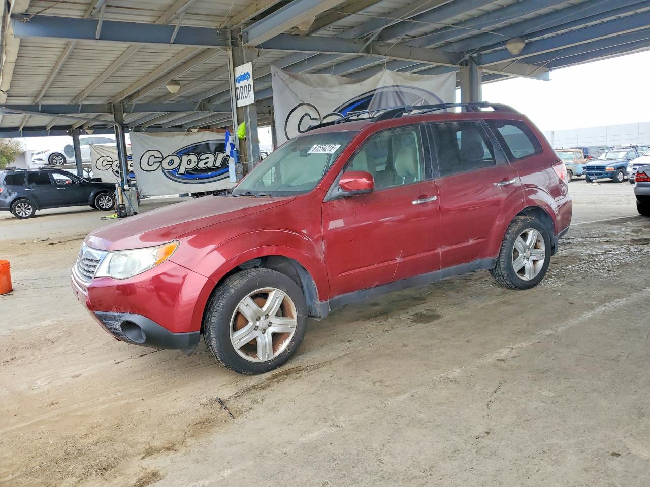 2010 Subaru Forester 2.5x Premium Burgundy vin: JF2SH6CC7AH786409