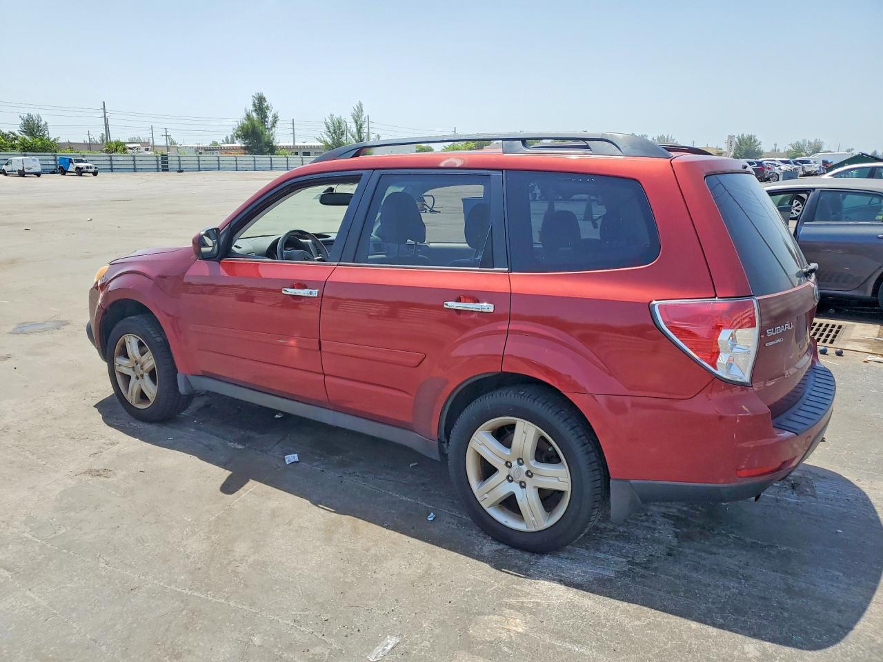 2010 Subaru Forester 2.5x Limited Red vin: JF2SH6DC0AH779526