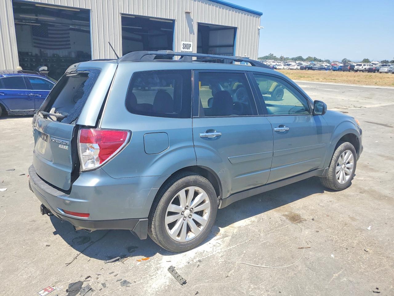2012 Subaru Forester 2.5x Premium Teal vin: JF2SHADC2CH443933