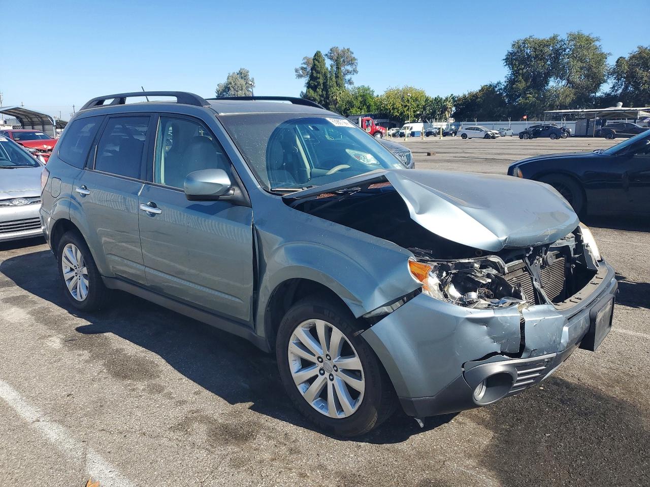 2012 Subaru Forester 2.5x Premium Blue vin: JF2SHADC4CH459177