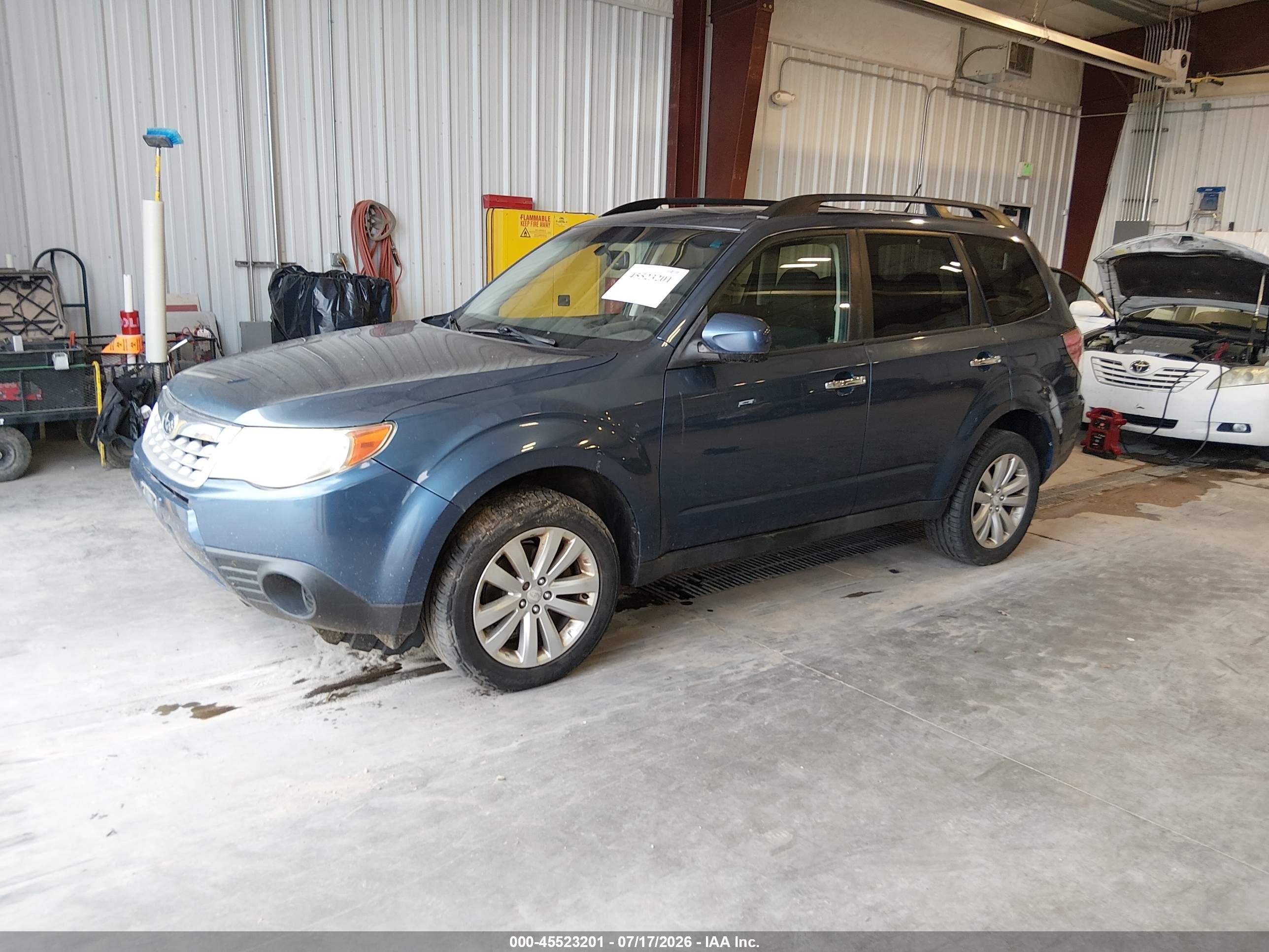 2012 Subaru Forester 2.5x Premium Blue vin: JF2SHADC5CH441917