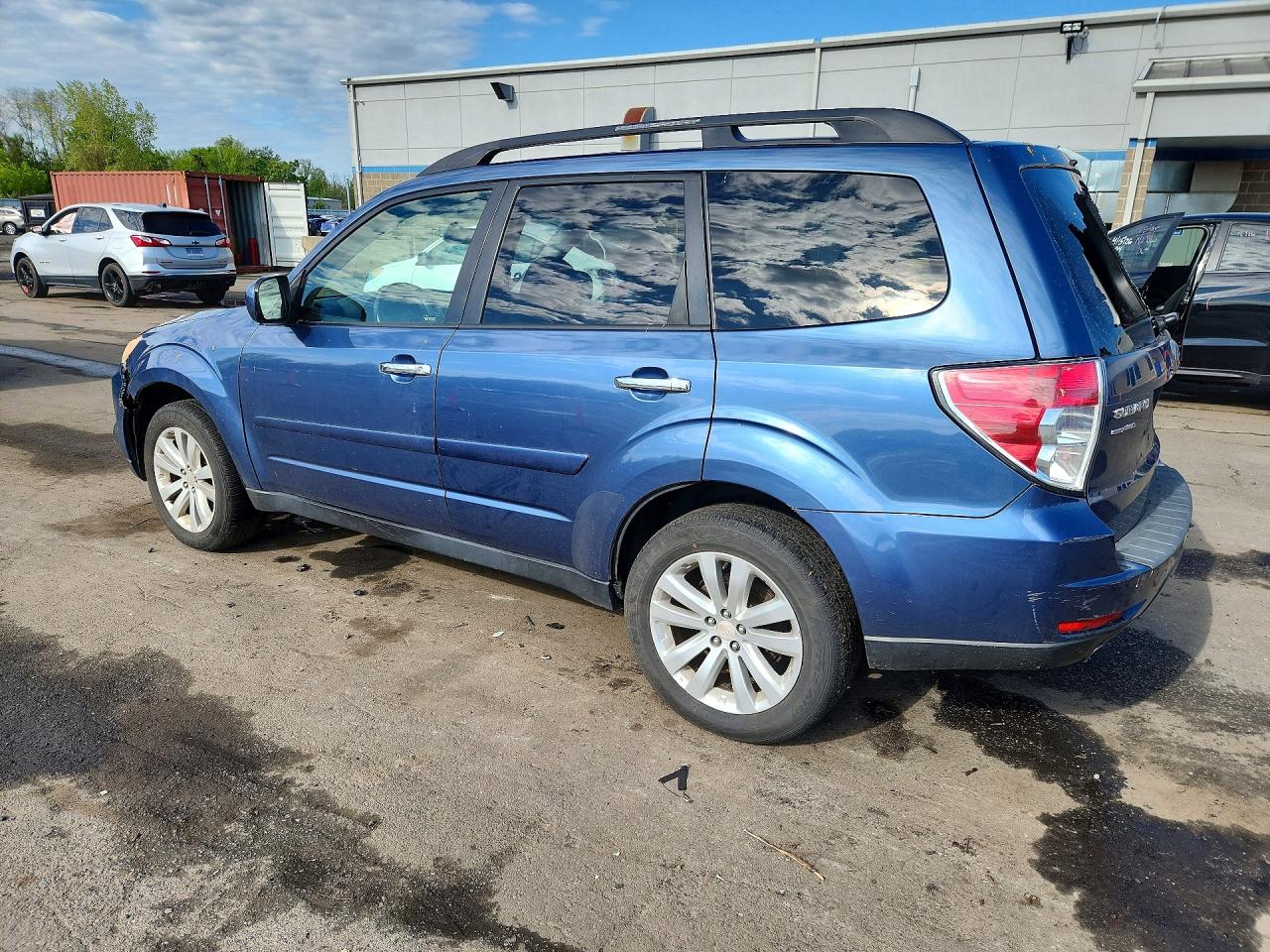 2012 Subaru Forester 2.5x Premium Blue vin: JF2SHADC6CH430859