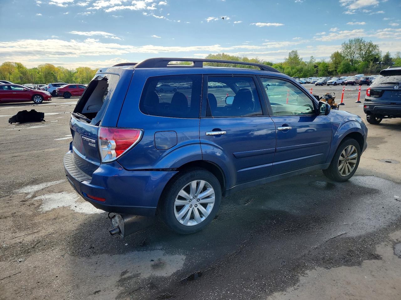 2012 Subaru Forester 2.5x Premium Blue vin: JF2SHADC6CH430859