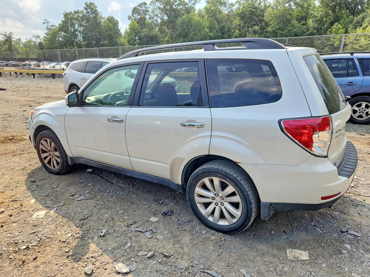 2012 Subaru Forester Limited Белый vin: JF2SHAEC0CH453942