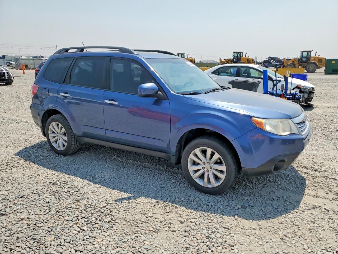 2011 Subaru Forester Limited Blue vin: JF2SHAEC9BH750870