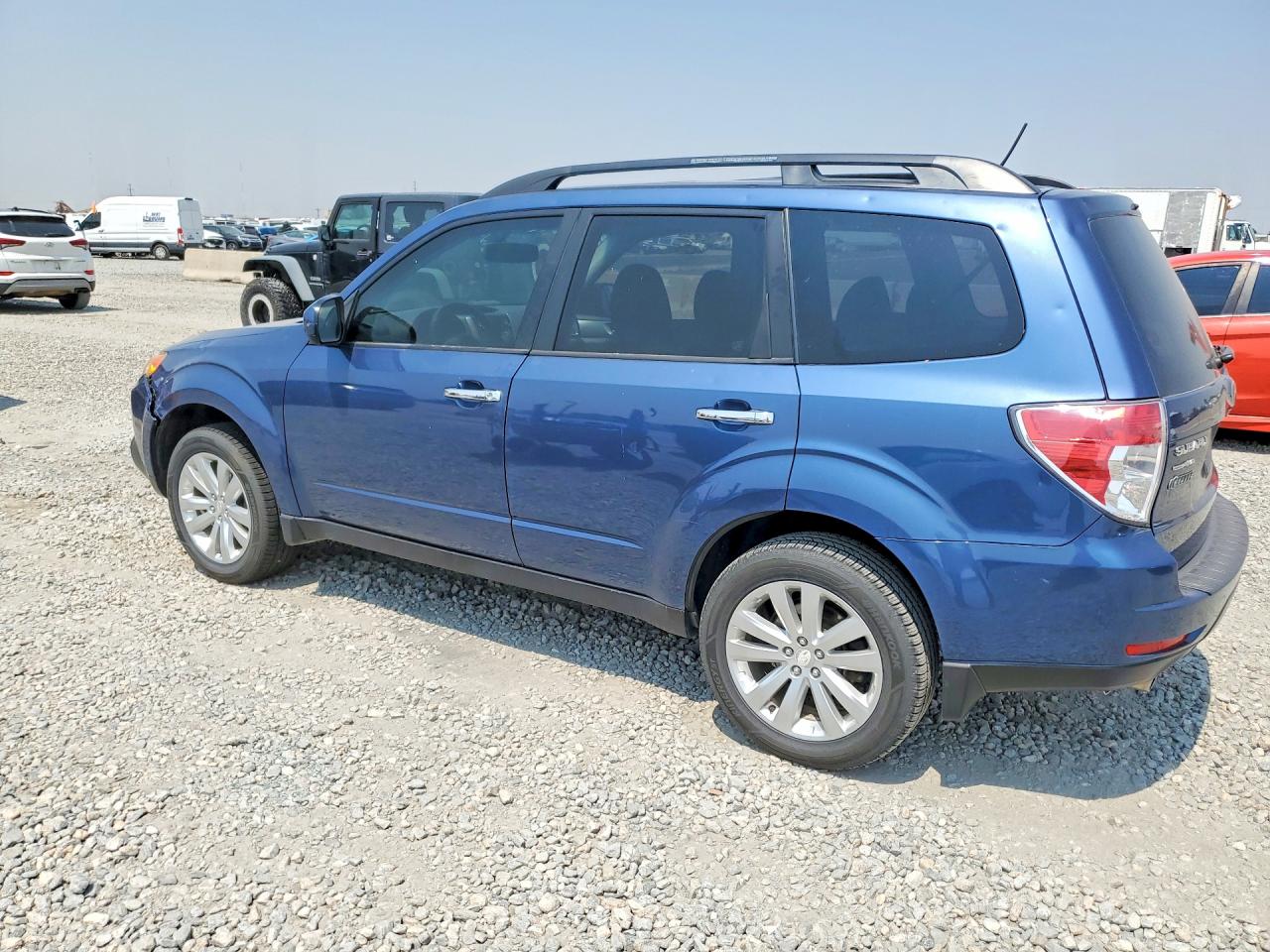 2011 Subaru Forester Limited Blue vin: JF2SHAEC9BH750870