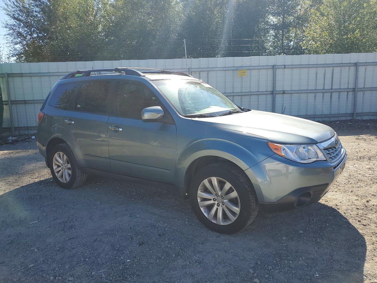 2011 Subaru Forester Limited Teal vin: JF2SHAEC9BH757012