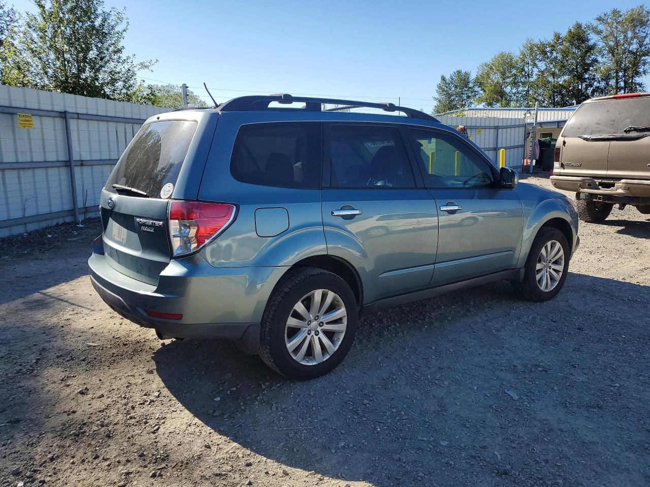 2011 Subaru Forester Limited Teal vin: JF2SHAEC9BH757012