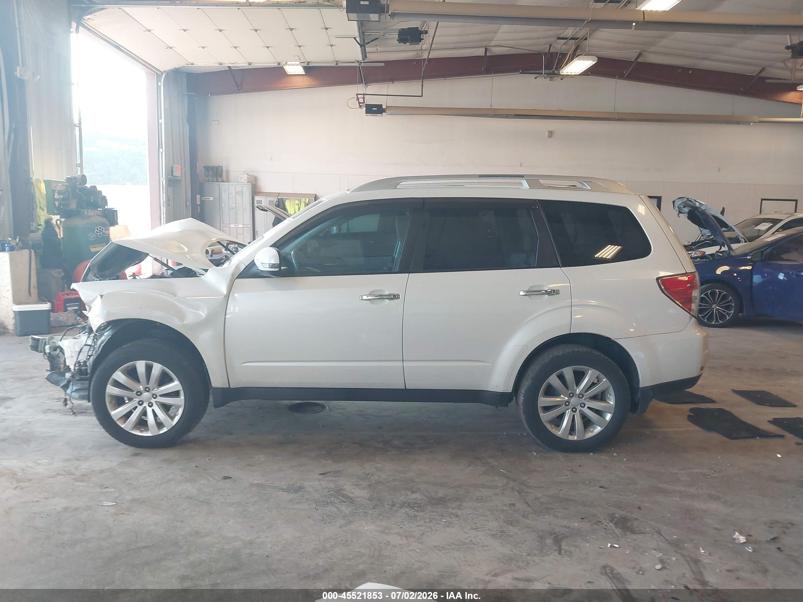 2012 Subaru Forester 2.5x Touring White vin: JF2SHAGC3CH443533