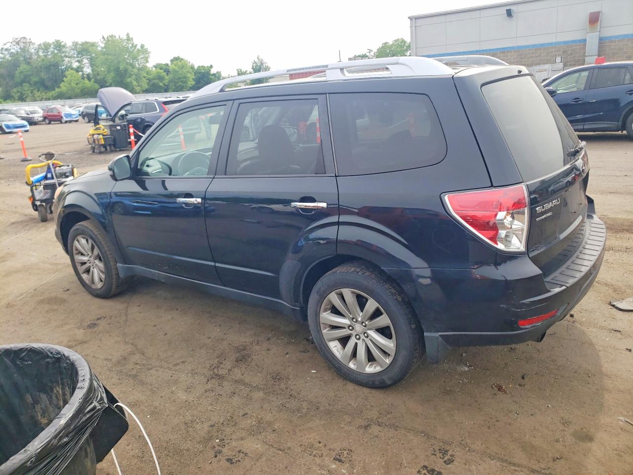 2011 Subaru Forester Touring Black vin: JF2SHAGC4BH711553
