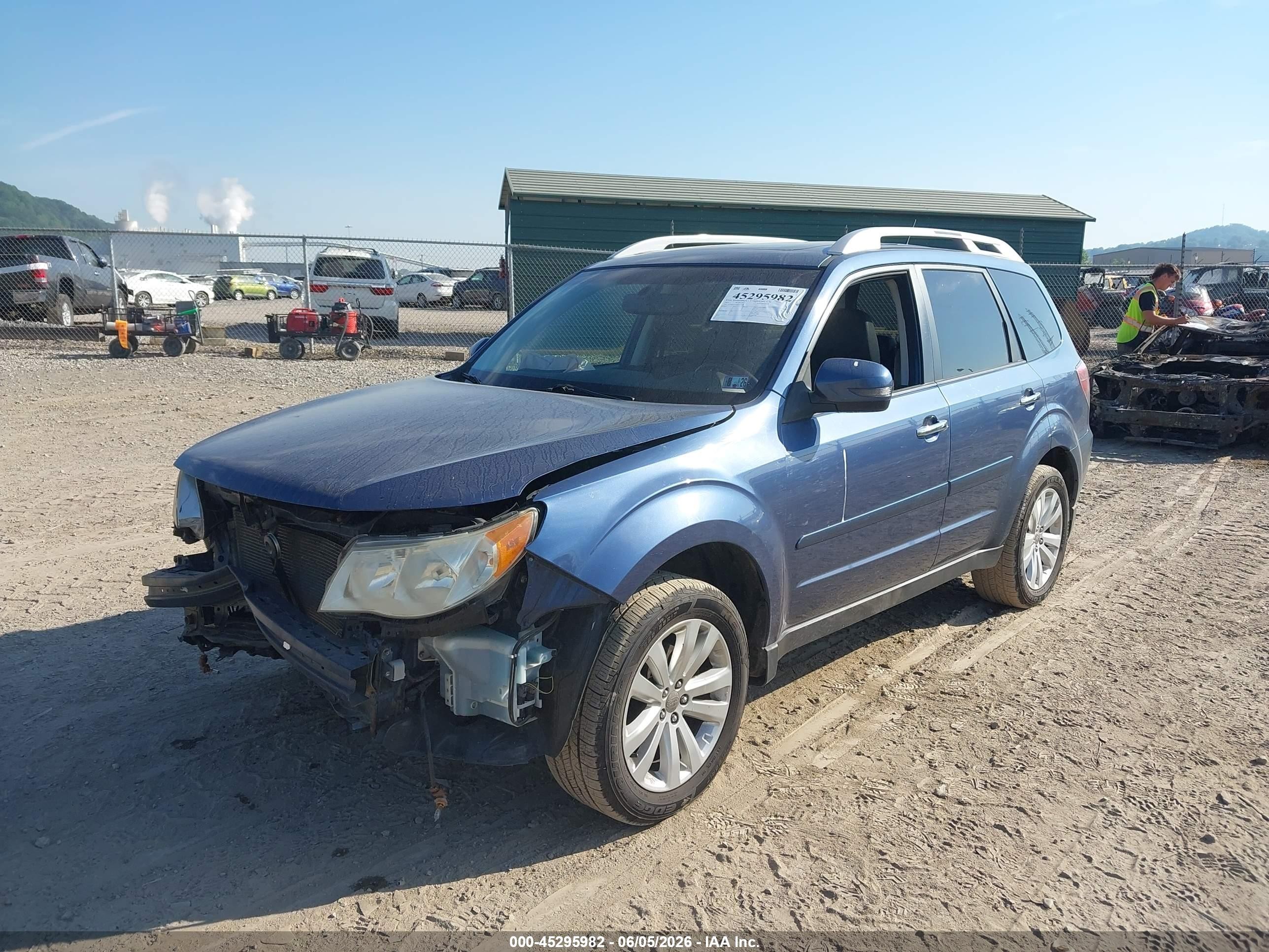 2011 Subaru Forester 2.5x Touring Blue vin: JF2SHAGC6BH753688