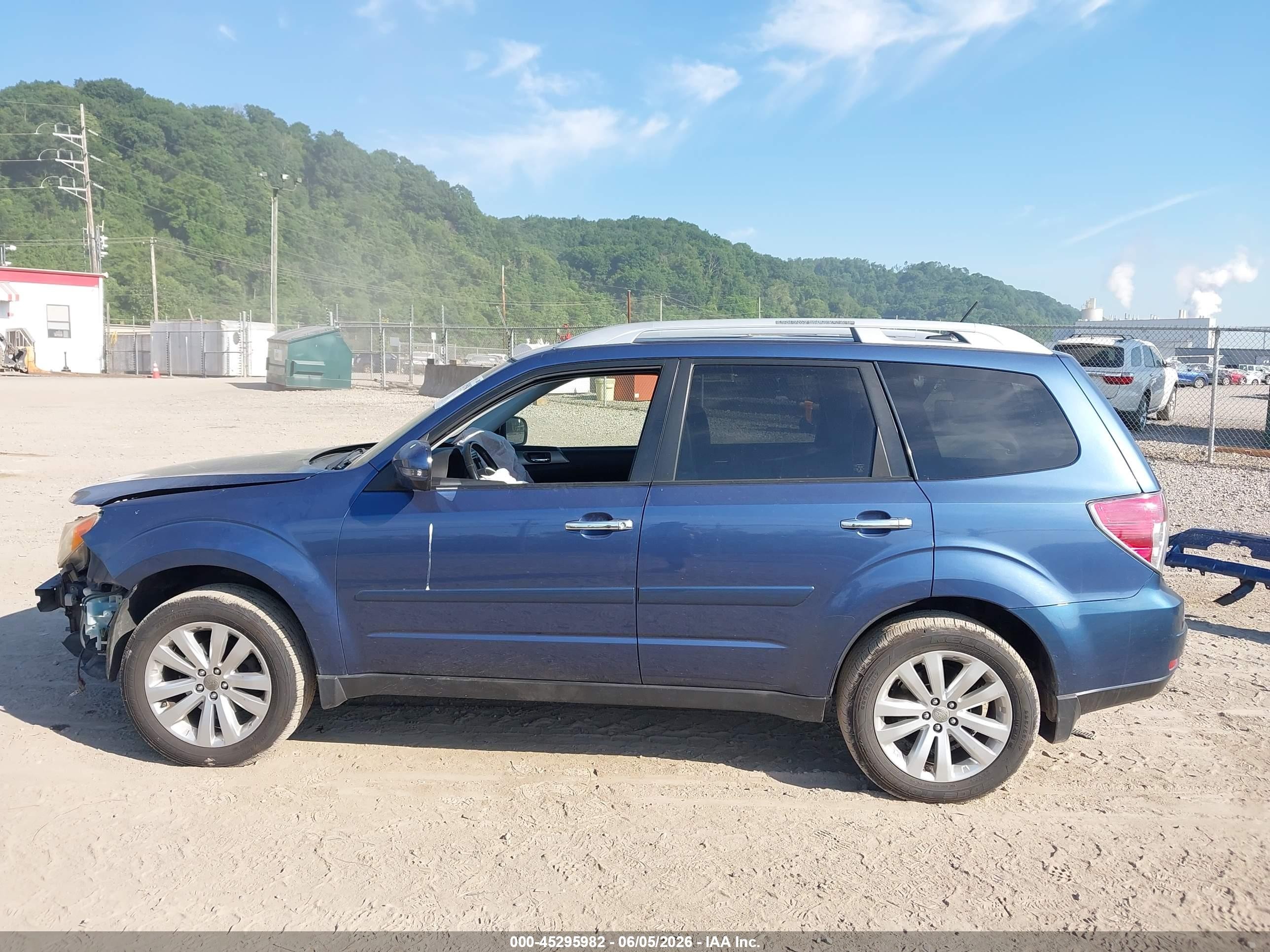 2011 Subaru Forester 2.5x Touring Blue vin: JF2SHAGC6BH753688
