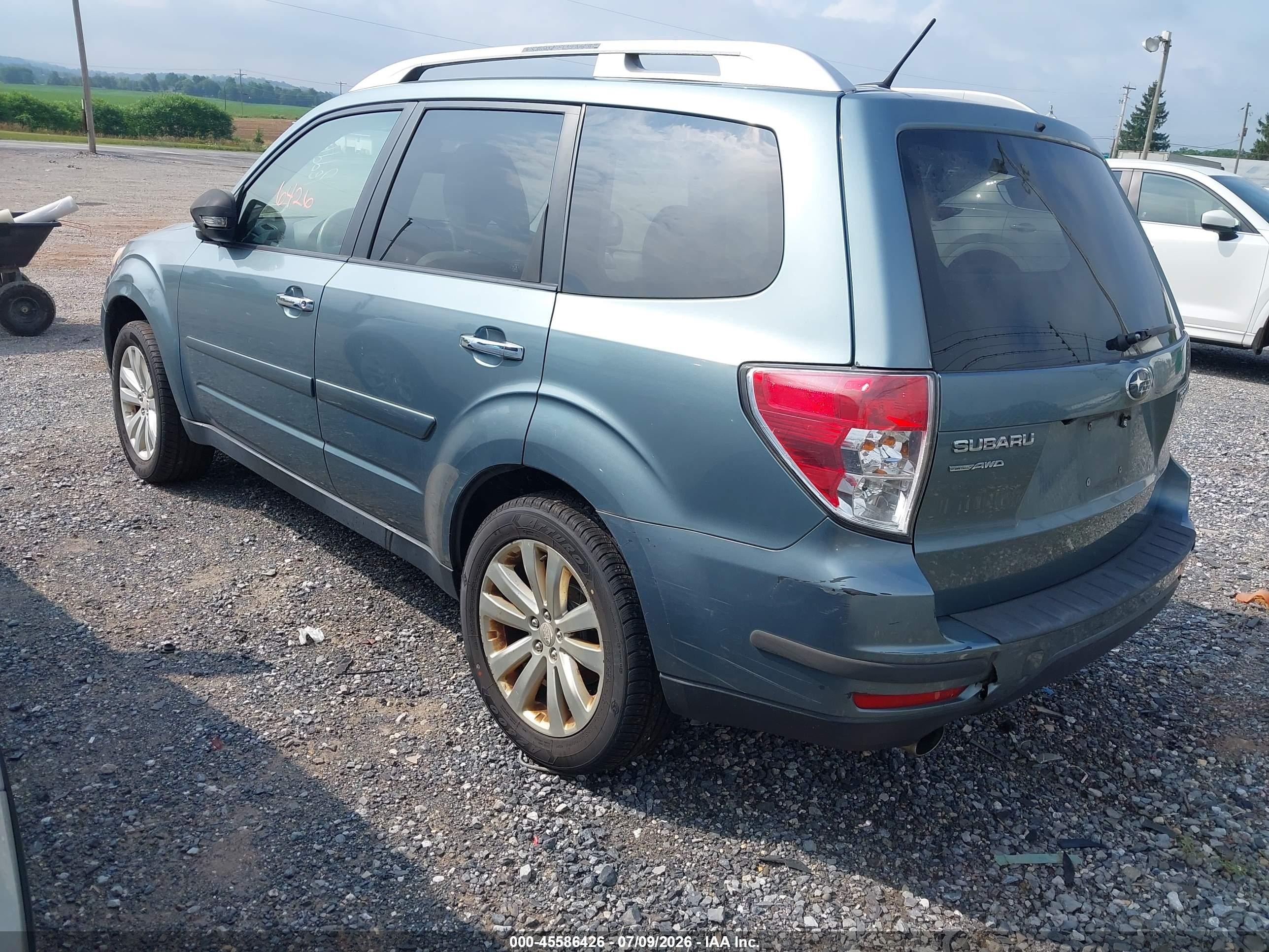 2011 Subaru Forester 2.5x Touring Teal vin: JF2SHAGC7BH758558
