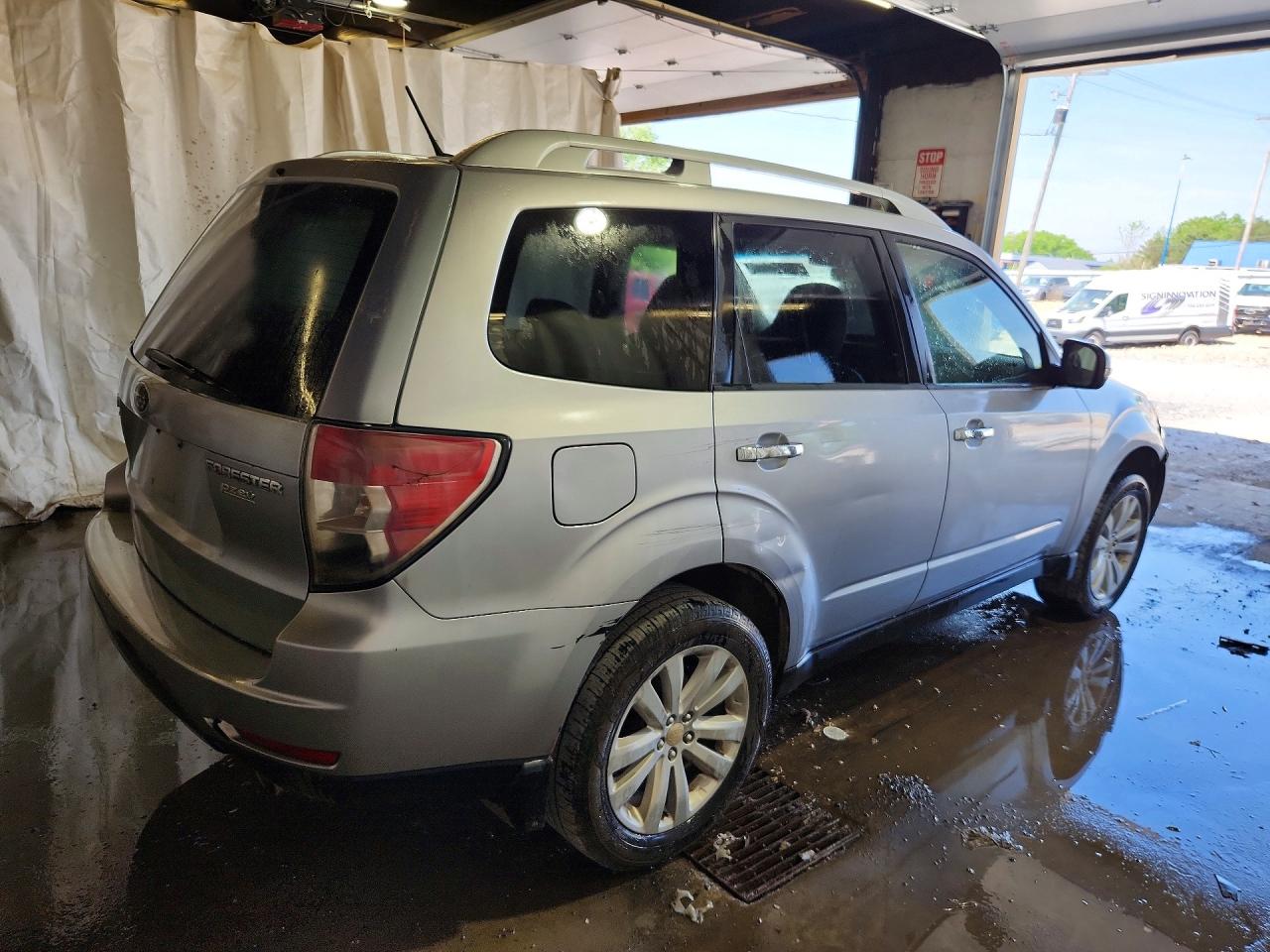 2012 Subaru Forester Touring Silver vin: JF2SHAGC7CH441400