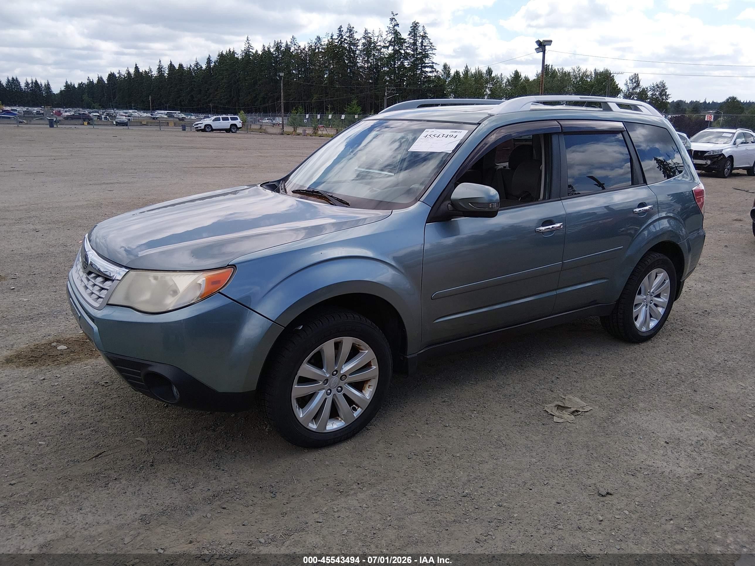 2013 Subaru Forester 2.5x Touring Light Blue vin: JF2SHAHC1DH402432