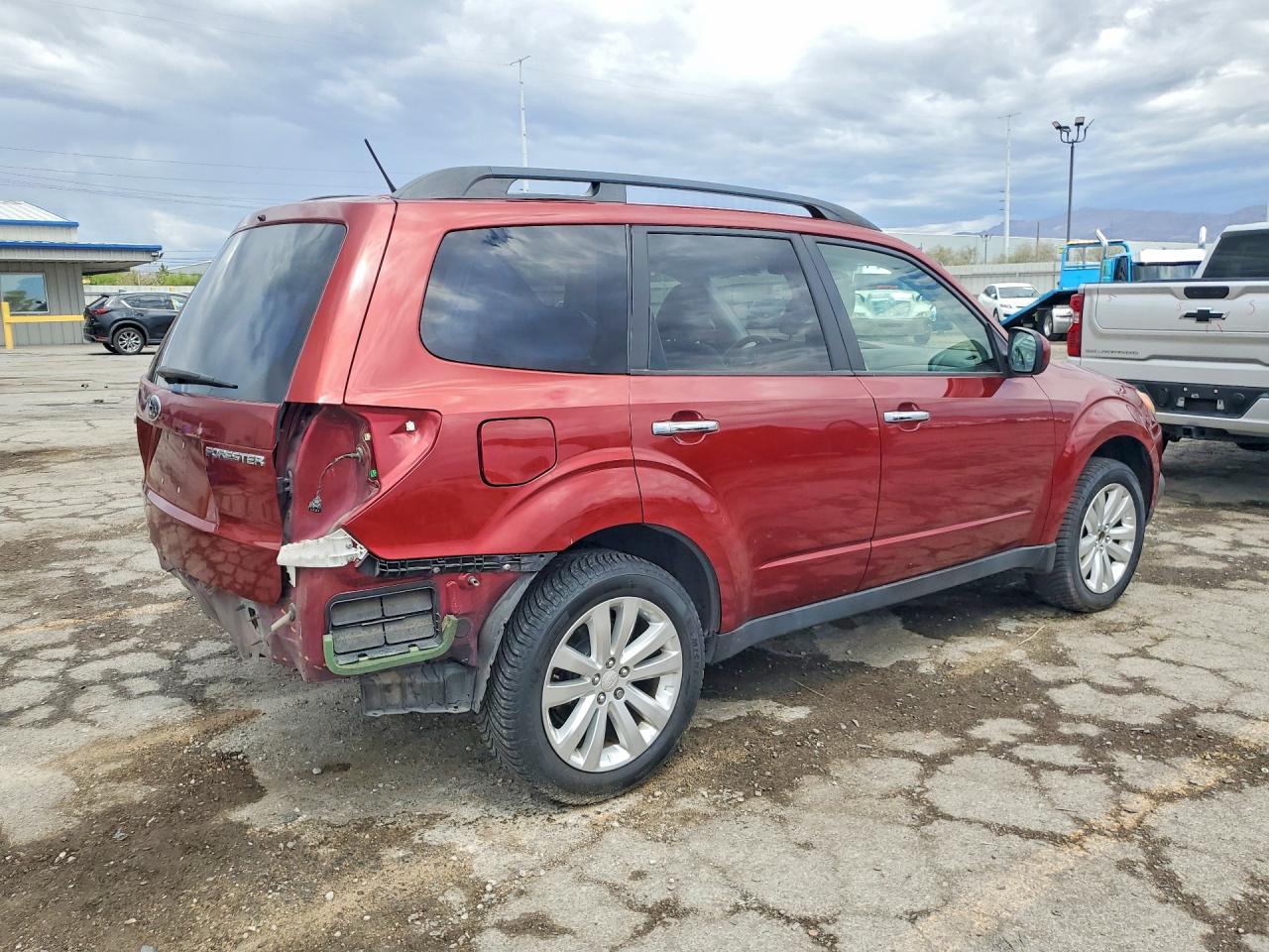 2012 Subaru Forester 2.5x Premium Burgundy vin: JF2SHBDC1CH441774