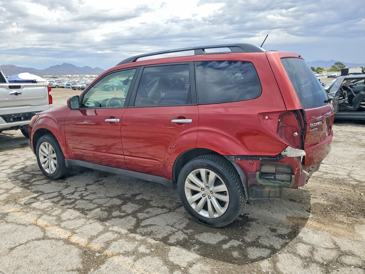 2012 Subaru Forester 2.5x Premium Burgundy vin: JF2SHBDC1CH441774