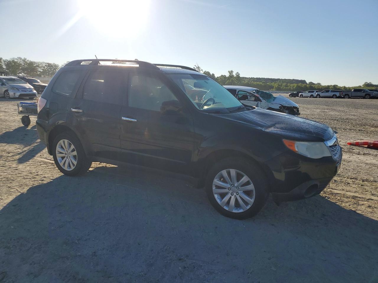 2012 Subaru Forester 2.5x Premium Black vin: JF2SHBDC8CH409730