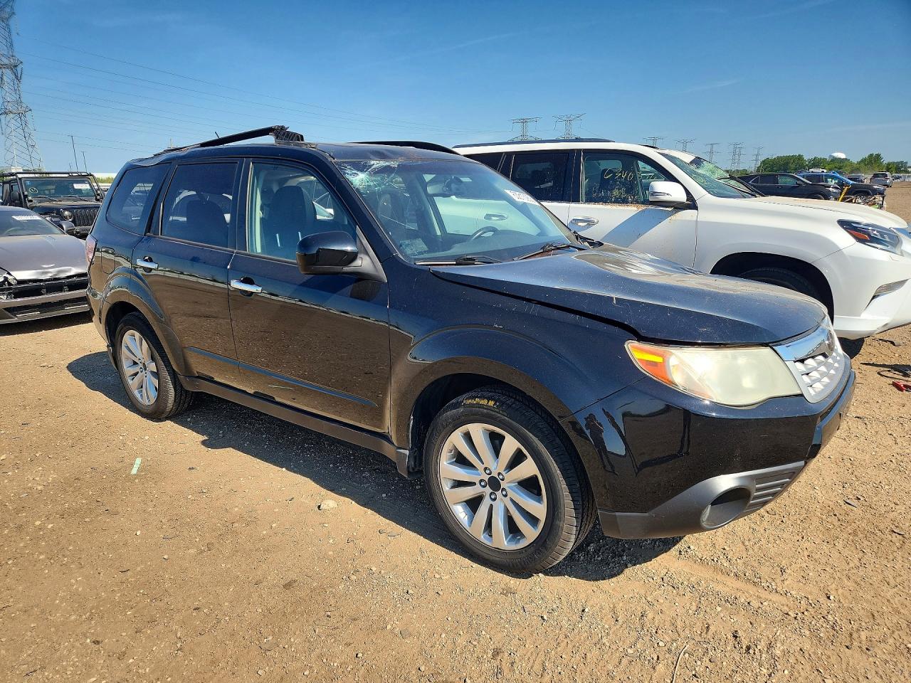 2011 Subaru Forester 2.5x Premium Black vin: JF2SHBDCXBH773890
