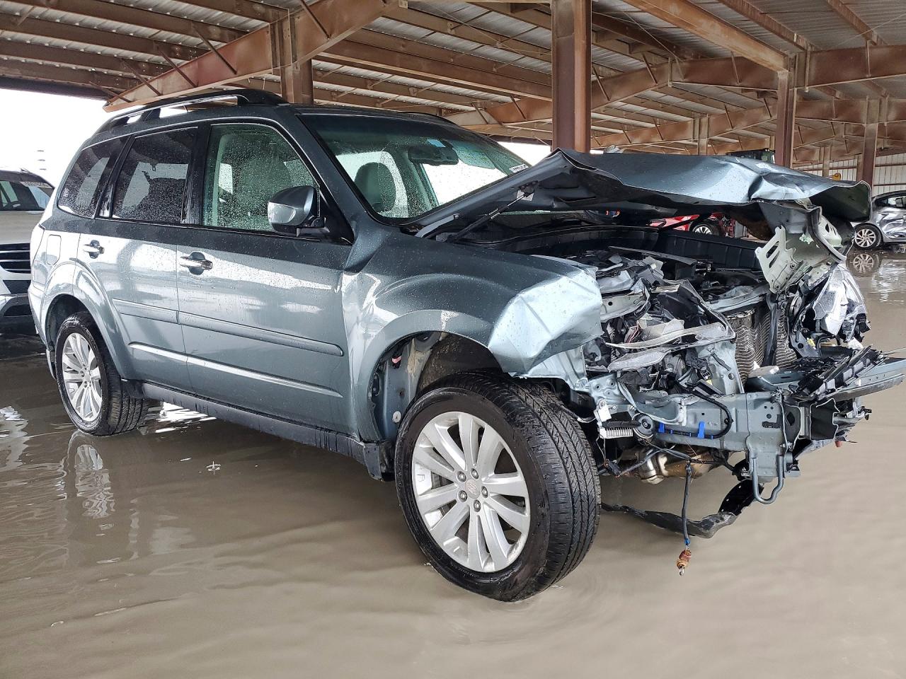 2012 Subaru Forester Limited Teal vin: JF2SHBEC7CH415579