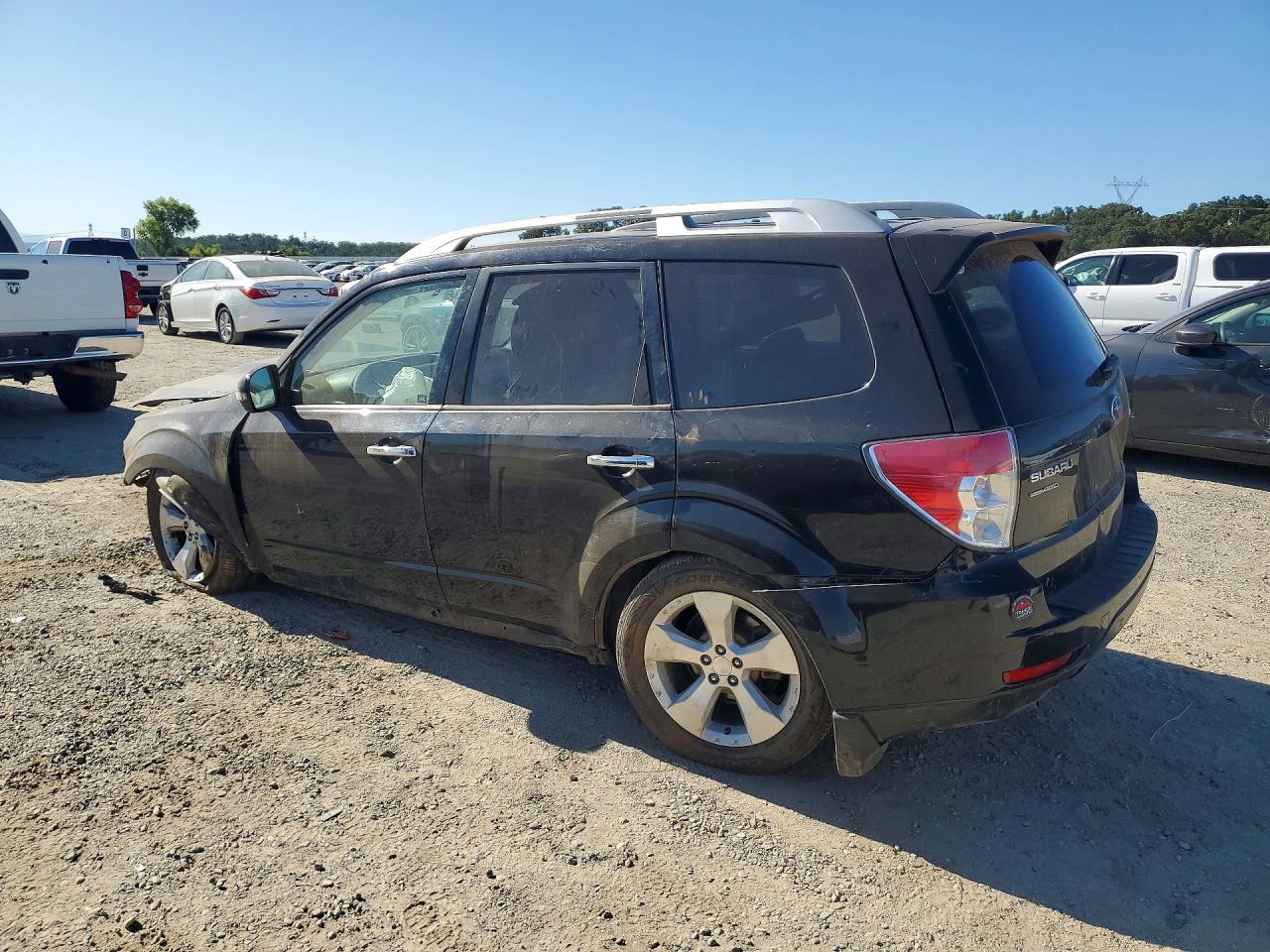 2011 Subaru Forester Touring Black vin: JF2SHGGC8BH739472