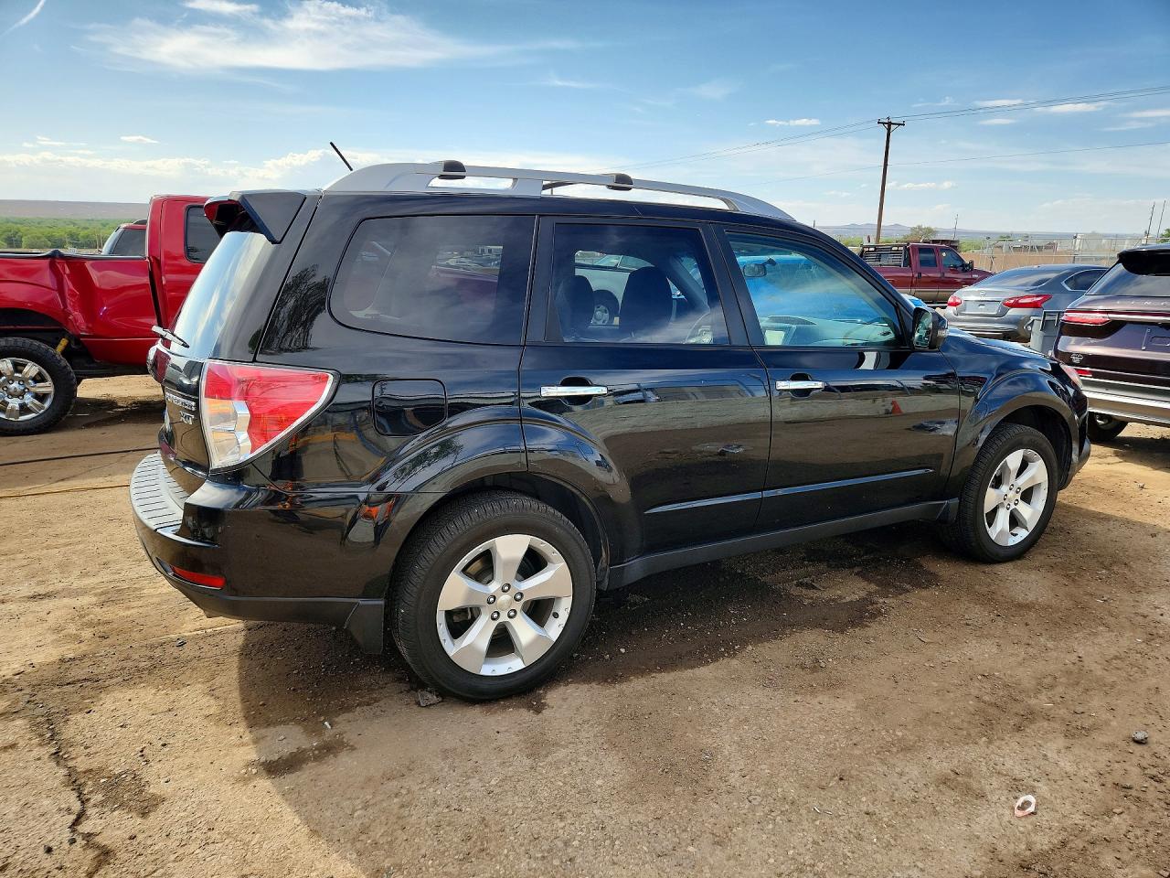2012 Subaru Forester Touring Black vin: JF2SHGHC3CH468109