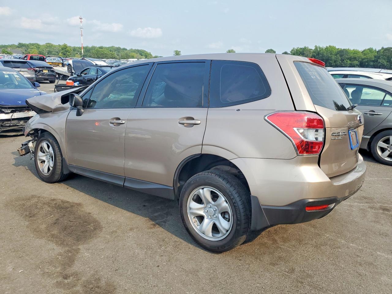 2014 Subaru Forester 2.5i Tan vin: JF2SJAAC2EH508758