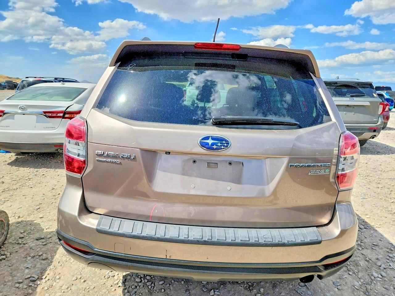 2015 Subaru Forester 2.5i Limited Tan vin: JF2SJAHC4FH410211