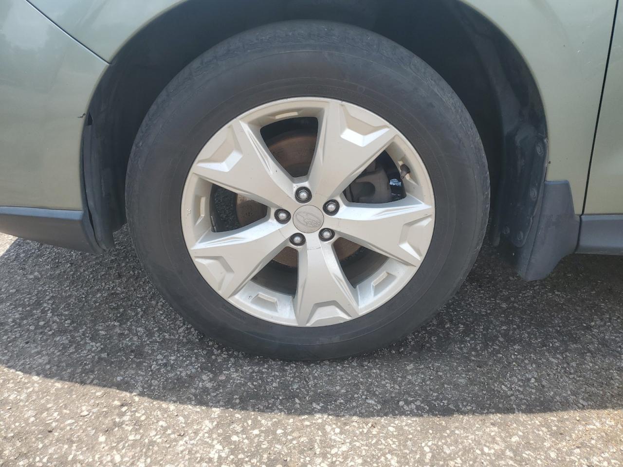 2014 Subaru Forester 2.5i Limited Green vin: JF2SJAHC6EH433942 Damage: Left Front Tire, Worn, Replacement Required