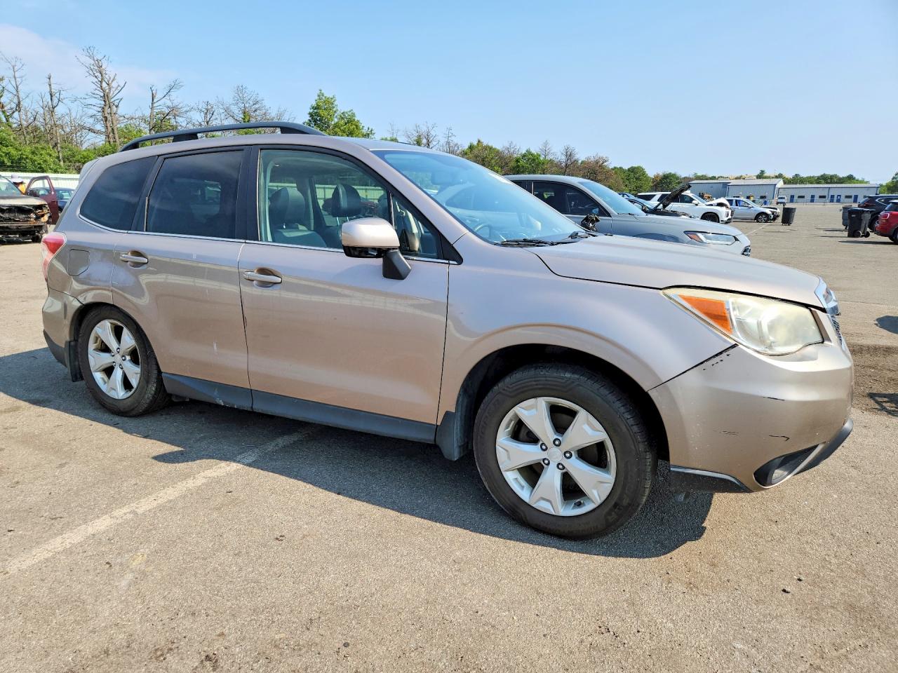2015 Subaru Forester 2.5i Limited Tan vin: JF2SJAHC8FH403858