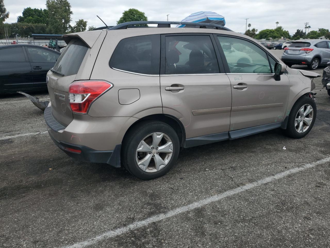 2014 Subaru Forester 2.5i Limited Tan vin: JF2SJAHC9EH505944