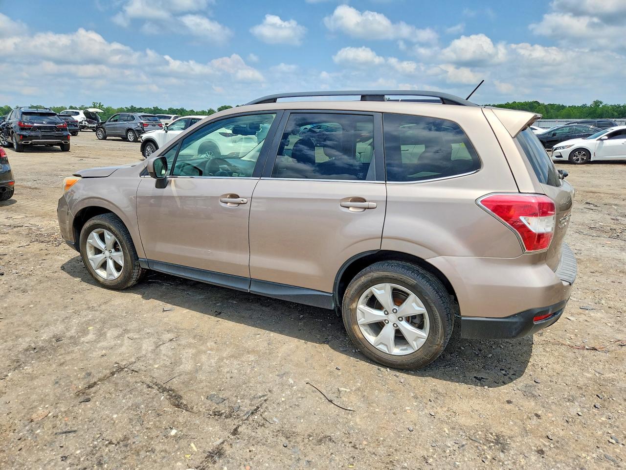 2015 Subaru Forester 2.5i Limited Tan vin: JF2SJAHC9FH403805