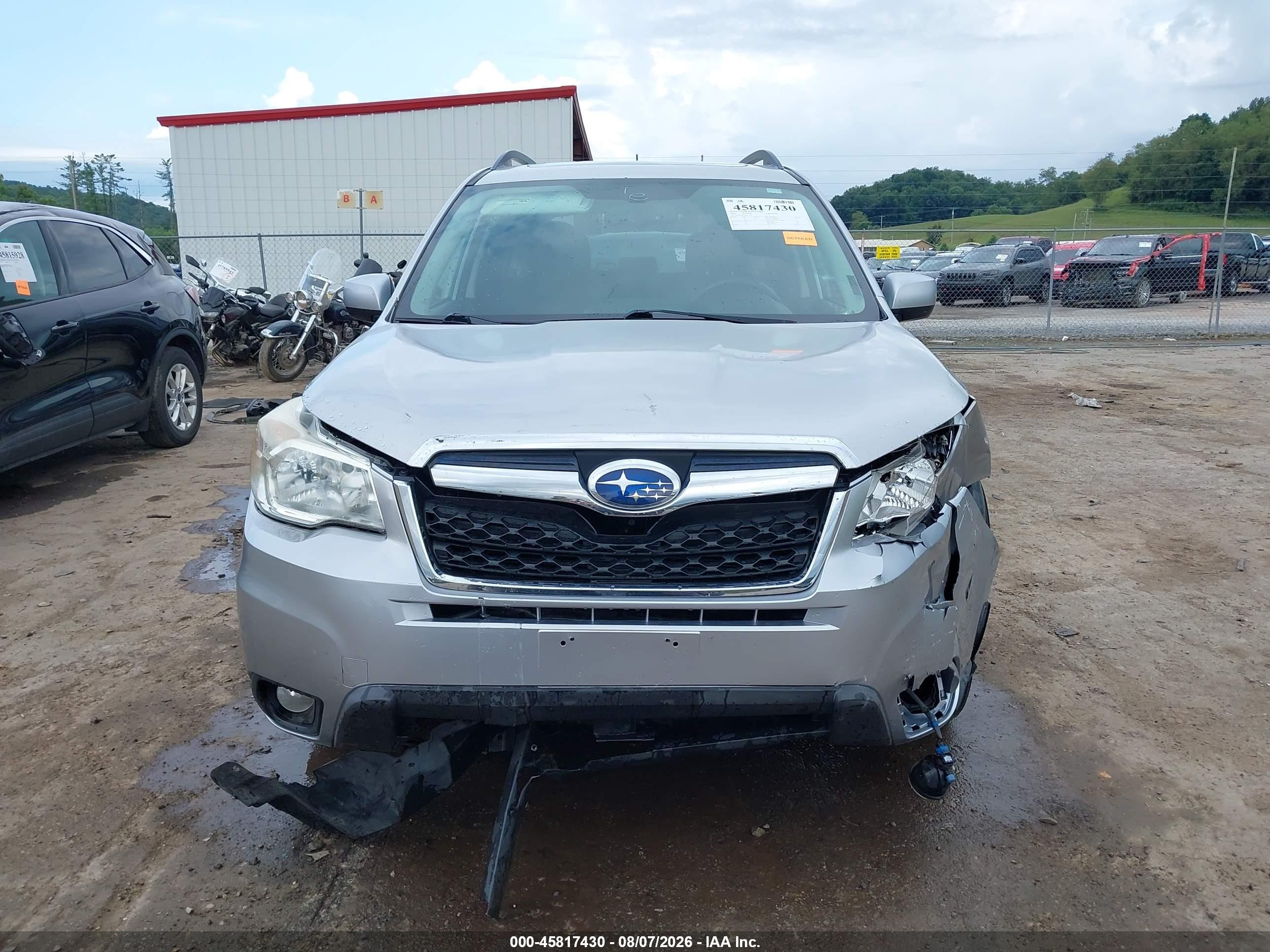 2014 Subaru Forester 2.5i Limited Серебряный vin: JF2SJAJC0EH407797
