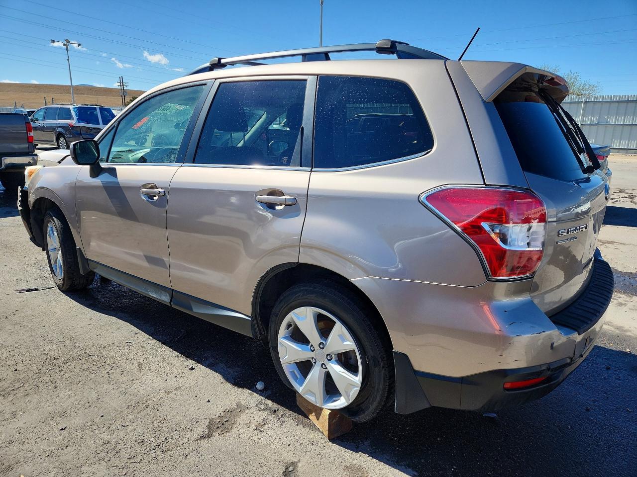2015 Subaru Forester 2.5i Limited Tan vin: JF2SJARC9FH441369