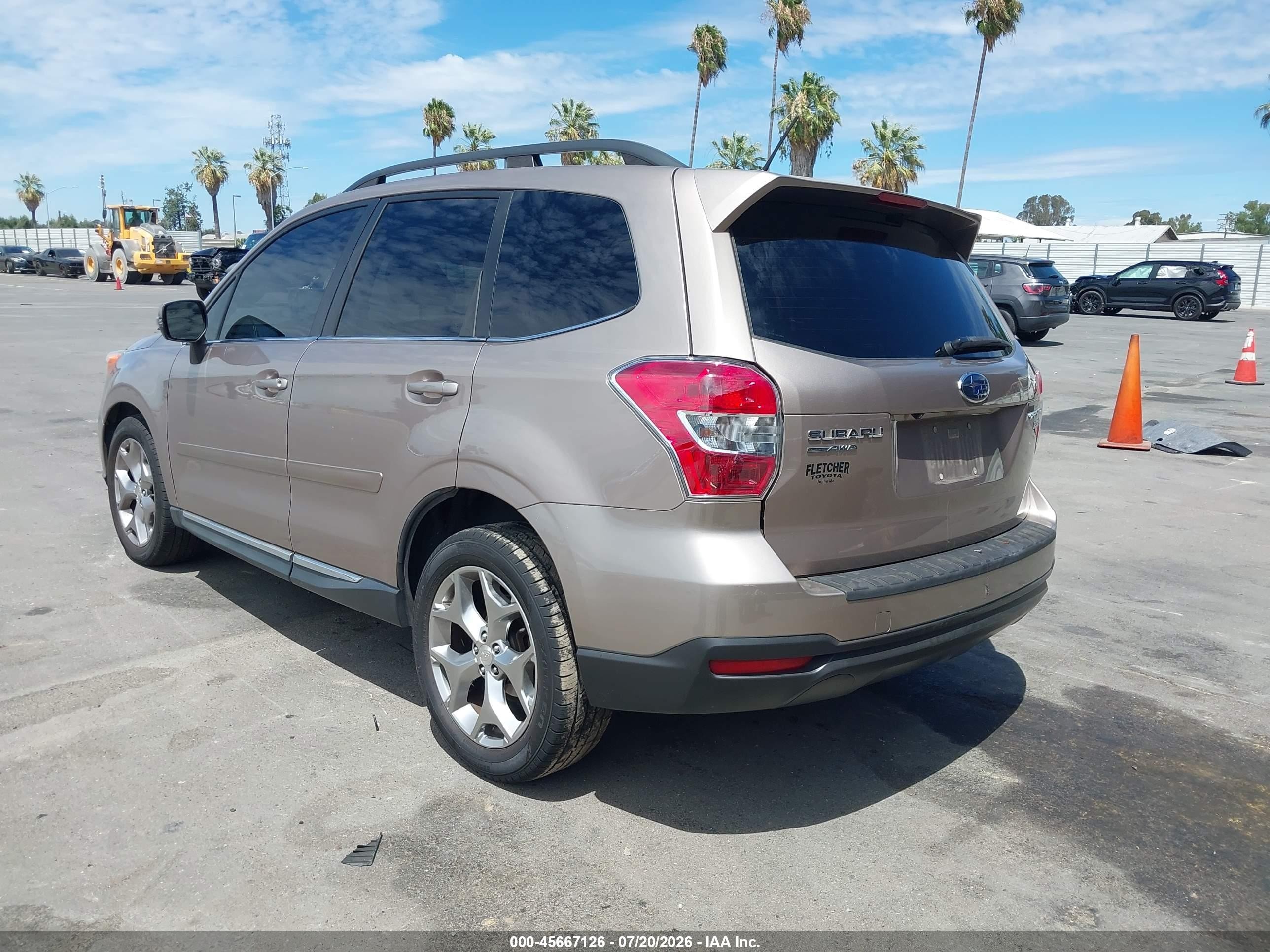 2015 Subaru Forester 2.5i Touring Tan vin: JF2SJAUC4FH569686